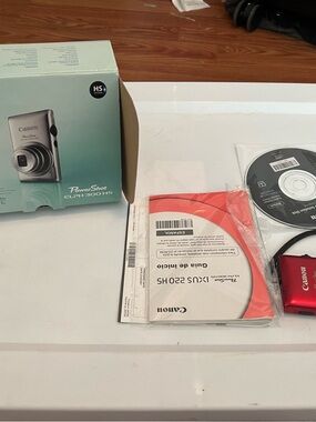 Canon Red Compact PowerShot Camera and Manuals Bundle